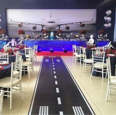 an airplane themed event with tables and chairs