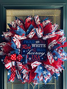 a patriotic wreath with red, white and blue decorations