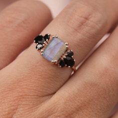 Product Description: 14kt rose gold vermeil, 8x6mm labradorite, 5x3mm pear cut black onyx, 3x1.5mm pear cut black onyx Onyx Ring Engagement, Engagement Ring Silver, Gold Ear Climbers, Gemstone Stacking Ring, Emerald Cut Ring, Emerald Cut Rings, Opal Ring Gold, August Birthstone, Black Onyx Stone