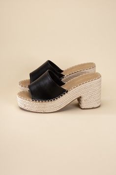 Step into style and comfort with our black Platform Espadrille Heel Mules! Perfect for any vacation or beach getaway, these mules will elevate your look with their trendy block heel. Slip them on and step out in style! Fit true to size High Heel Mules With Padded Heel For Beach, Beach Open Toe Mules With Padded Heel, Heeled Mules With Padded Heel For Beach, Black High Heel Wedge Sandals For Beach, Black Wedge Sandals For Beach And Spring, Black Wedge Sandals For Beach In Spring, Black Wedge Sandals For Beach, Spring Season, Vacation High Heel Mules With Padded Heel, High Heel Mules With Padded Heel For Vacation