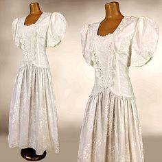 This Is An Iconic Vintage 1980's Victorian Revival Dress Made By "Scott Mcclintock". It Is Made Of A White Floral Pattern On Cream 100% Cotton Fabric. It Features A White Crochet Collar, Puff Sleeves Lined With Tulle That Makes Them Stay Up, Padded Shoulders, And A Drop Waist With A Full Sweep. It Is Stunning! A Wonderful Alternative Wedding Dress Look, Very Cottagecore. Labeled A Size 10- Vintage Sizing Does Not Equal Modern Sizing- Please Use The Measurements For An Accurate Fit - Meant To Fit Scott Mcclintock Dress, Cottage Dress, Alternative Wedding Dress, Alternative Wedding Dresses, Victorian Revival, Crochet Collar, Alternative Wedding, Dresses Vintage, White Crochet