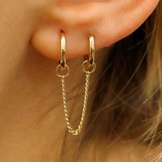 Elevate your ear game with this bold solid gold rope chain earring charm. Create unique, asymmetrical looks with multiple piercings. This 14k solid gold chain adds a touch of edge and eye-catching movement with a polished shine. Perfect for those who love a bolder earring style or as a unique gift! - Handmade - Solid Gold - Bail Inner Diameter: 2.5 mm - Length: 3 inches * Price is only for one charm *  ** Huggies sold separately **  🛠 Your Sarah Elise piece is handcrafted with care! Ready-to-ship items go out within 3 business days. Made-to-order pieces typically take 7-10 business days to create. If you need something sooner, please contact us - we'll see if we can make it happen! For estimated shipping dates and tracking, check your Etsy account under 'Orders'. 🚐Orders under $100 are s Gold Plated Dangle Earrings With Cable Chain, Gold-plated Dangle Earrings With Cable Chain, Gold Hoop Earrings With Cable Chain For Gift, Gold Chain Cartilage Earrings As A Gift, Gold Cartilage Earrings With Chain As Gift, Dangle Chain Hoop Earrings As Gift, Gold Dangle Chain Cartilage Earrings, Memory Ring, Earring Charm