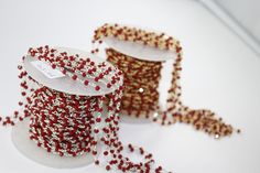 Beautiful Red Onyx Rosary Beads Chain Available in both Silver Plating and Gold Plating. Stone: Red Onyx Hydro Gemstone Beads Sizes: 1, 3, 5, 10, 25, 50 feets Stone Size: 3-3.5 mm Plating: Gold Plating and Silver Plating Beads Style: Faceted Beads Beads Shape: Rondelle Beads Rosary Beads Chains are just perfect for all Jewelry making crafts. Jaipur Gems House always guarantees you the highest quality of all our products. Please note: Multiple feet will be sent in one continuous length. To Check Red Round Beads Jewelry For Christmas, Red Faceted Beads Jewelry For Christmas, Christmas Party Beaded Necklaces With Round Beads, Christmas Party Round Bead Necklaces, Oval Beads Beaded Necklaces For Party, Party Jewelry With Oval Beaded Chain, Silver Beads For Parties, Red Beaded Necklaces For Parties, Red Beaded Necklace With Spacer Beads As Gift