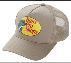 Get ready for your next fishing trip with this Bass Pro Shops hat. The adjustable snapback design ensures a comfortable fit, while the lightweight and breathable material make it perfect for any season. The solid khaki color and mesh back give it a stylish and practical look, perfect for any casual occasion. This classic snapback hat features a Bass Pro Shops logo and a variety of hunting and fishing themes, making it a must-have for any outdoors enthusiast. With its durable polyester fabric and sturdy construction, this hat is perfect for any adventure. Whether you're fishing for bass or turkey hunting, this hat is the perfect accessory to complete your look. Bass Pro Shops Hat, Bass Pro Shop Hat, Fishing Hat, Mesh Cap, Khaki Color, Bass Fishing, Adjustable Hat, Trucker Cap, Snapback Hats