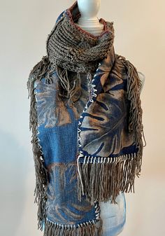 Welcome to LM Handmade Boutique! New! One of a kind hand painted scarf! Wrap yourself in this work of art! With fall vibes and bohemian style this one of a kind scarf will add a unique touch to any outfit.  MORE DETAILS: * One of a kind.  * Hand painted with freestyle gold leaves  * Upcycled denim * Crochet detail and lots of fringe  * Free shipping  This scarf makes a great gift! MORE BOHO FASHION HERE: http://lmhandmadeboutique.etsy.com/ Follow me: INSTAGRAM @lmhandmadeboutique Facebook https://www.facebook.com/LMHandmadeBoutique/ QUESTIONS? My name is Lisa, so if you have any questions about this upcycled scarf please use the message button below and I'll be more than happy to help. Thank you for shopping at LM Handmade Boutique! Denim Crochet, Boho Crochet Patterns, Wearable Art Fashion, Fall Scarf, Follow Me Instagram, Leaf Scarf, Hand Painted Scarves, Crochet Mandala Pattern, Fabric Scarf