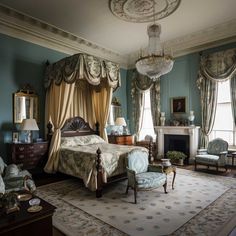 a bedroom with blue walls and curtains on the windowsills is furnished with antique furniture