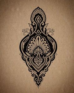 an ornate design on brown paper