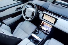 the interior of a modern car is clean and ready for customers to ride in it