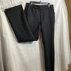 Size 10. Inseam 31.5” Classic Fitted Pinstripe Pants, Fitted Pinstripe Dress Pants For Business, Formal Pinstripe Straight Leg Dress Pants, Formal Pinstripe Dress Pants With Straight Leg, Fitted Pinstripe Dress Pants, Black Flat Front Dress Pants For Office, Classic Black Pantsuit For Office, Classic Fitted Pinstripe Bottoms, Classic Black Career Pantsuit