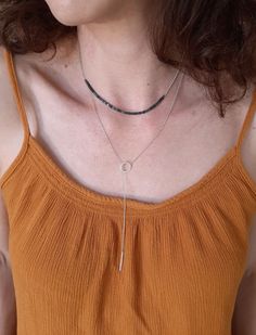 This Lariat necklace is totally handmade made from sterling silver. A dainty necklace that adjusts to any outfit. Great layering charm necklace, easy to wear on its own too. The diameter of the circle is 12 mm and the bar is 20 mm long. Length: 52 cm -----> 20 inches 62 cm -----> 24 inches 72 cm -----> 28 inches Feel free to ask for a different length. The necklace above is not the exact one you will receive. Each one is handmade to order and may slightly vary from the pictures. Please Handmade Minimalist Lariat Necklace, Handmade Minimalist Long Lariat Necklace, Minimalist Handmade Long Lariat Necklace, Minimalist Lariat Necklace With Silver Chain, Sterling Silver Clavicle Chain Lariat Necklace For Everyday, Sterling Silver Lariat Necklace For Everyday, Everyday Sterling Silver Lariat Necklace With Clavicle Chain, Minimalist Silver Necklace With Adjustable Length, Silver Dainty Lariat Necklace For Layering