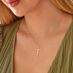 "The cross-shaped necklaces with the Jesus inscription symbolize the messages of salvation, mercy, and love in the Christian faith. It can be a meaningful gift option, especially for people who are committed to the Christian faith. Additionally, the cross symbol is often used as a symbol of protection and healing, so this necklace can provide the owner with a sense of protection, hope, and peace. Thanks to its stylish design and meaningful symbolism, this necklace can be chosen as a gift for spe Inspirational Gold Cross Jewelry, Personalized Elegant Cross Necklace, Inspirational Gold Cross Necklace, Dainty Crucifix Necklace As A Gift, Cross Necklace For Mother's Day, Minimalist Personalized Cross Necklace, Personalized Yellow Gold Cross Necklace, Elegant Personalized Cross Necklace, Minimalist Personalized Gold Cross Necklace