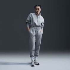 Rise up and transform your wardrobe with strong cozy vibes. Made with midweight brushed fleece that feels extra soft on the inside and smooth on the outside, these sweats help you stay cozy while offering a structured shape. A tapered fit finishes with a cinch at the ankles that helps you show off your favorite kicks. Gray Athleisure Joggers With Elastic Cuffs, Athleisure Bottoms With Elastic Cuffs For Winter, Nike Fleece Activewear With Elastic Waistband, Nike Winter Leisure Sweats, Winter Athleisure Joggers With Ribbed Cuffs, Nike Sporty Leisure Sweatpants, Winter Fleece Joggers In Athleisure Style, Athleisure Joggers With Ribbed Cuffs For Winter, Winter Athleisure Tracksuit With Elastic Waistband