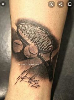 a tattoo on the leg of a person with a tennis racket and balls