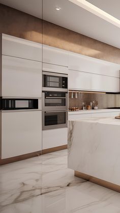 a modern kitchen with marble counter tops and white cabinets, along with an island in the middle