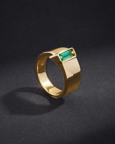 Suzanne Kalan One of a Kind Single Baguette Emerald Band in 18k yellow gold Luxury Formal Emerald Ring With Channel Set, Luxury Channel Set Emerald Ring For Formal Occasions, Timeless Rectangular Brilliant Cut Emerald Ring, Luxury Polished Emerald Ring, Formal Rectangular Emerald Ring With Polished Finish, Luxury Yellow Gold Emerald Ring With Polished Finish, Luxury Emerald Ring In Rectangular Shape, Luxury Emerald Ring With Rectangular Stone, Luxury Emerald Ring With Rectangular Shape