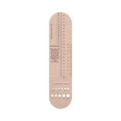 a wooden ruler with numbers on it