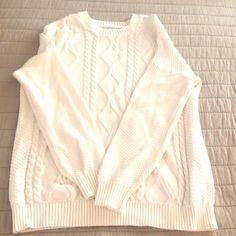 Very Cute Excellent Condition No Rips Or Stains Only Worn A Couple Times Looks Brand New. It’s A Very Creamy White Color Casual Off White Cable Knit Sweater, Casual Off-white Cable Knit Sweater, Casual Off White Soft Knit Sweater, Casual White Knitted Sweater, Casual Off White Knitted Sweater, Casual Off-white Knitted Sweater, Cozy White Crew Neck Knit Top, Casual Knitted Tops In Winter White, White Cable Knit Top For Winter