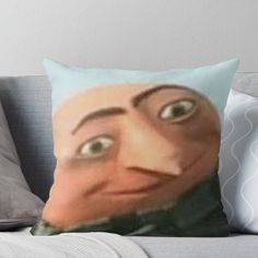 a pillow with an image of a man's face on it and eyes open