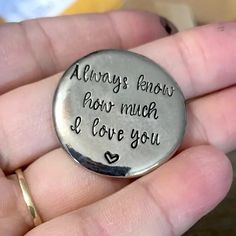 someone is holding a pin with the words always know how much i love you