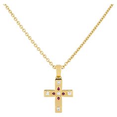 Cartier 18 Karat Yellow Gold Vizantija Diamond & Ruby Pendant Cross Necklace This Cartier 18K Yellow Gold Cross Necklace is a stunning blend of elegance and spiritual symbolism. This exquisite piece is crafted from luxurious 18 karat yellow gold and adorned with brilliant diamonds and rubies at its center, creating a striking contrast. Ideal for both daily wear and special occasions, this necklace adds a touch of elegance to any outfit. Brand: Cartier, Vizantija Collection Material: 18k Yellow G Luxury Yellow Gold Cartier Necklace, Cartier Luxury Wedding Necklace, Luxury Cartier Necklaces For Wedding, Luxury Cartier Necklace For Wedding, Gold Cartier Necklace Hallmarked, Luxury Cartier Necklace, Luxury Hallmarked Cartier Necklace, Cartier Luxury Gemstone Jewelry, Luxury Cartier Gemstone Jewelry