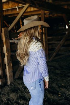 Yeehaw to the cutest cowgirl shirt in town! The Dollie Shirt features a playful mix of floral print and stripes, perfect for bringing some fall flair to your western style. With a classic button down design in a beautiful blue color, you'll want to wrangle this top into your wardrobe ASAP. Courtney is wearing size small paired with The Derek Jeans, The Adaire Mules, Felt Cowboy ProHat and Cattle Guard Wild Rag Cowgirl Shirts, Wild Rag, Heritage Collection, Curvy Dress, Bottoms Pants, Western Fashion, Sweater Top, Clothes For Sale, Jumpsuit Romper