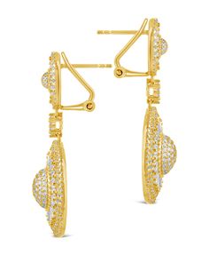 Make a statement whenever you drop into the room! Our Jessica Statement Earrings sparkle with CZ stones and are perfect for adding some serious sass to any look. Materials: 14K gold or rhodium plated brass, cubic zirconia Features: 1.7" drop, 0.5" stud, 0.5"-0.85" width, 1mm-3mm stones, Lead & Nickel free, post back Gold Chandelier Earrings With Diamond Accents For Anniversary, Cubic Zirconia Chandelier Drop Earrings With Bling, Formal Diamond Plated Earrings, Gold Earrings With Pave Setting For Weddings, Elegant Gold Cluster Earrings With Pave Setting, Cubic Zirconia Plated Earrings, Formal Plated Cubic Zirconia Earrings, Diamond White Bling Earrings For Formal Occasions, Diamond Pave Setting Earrings For Party