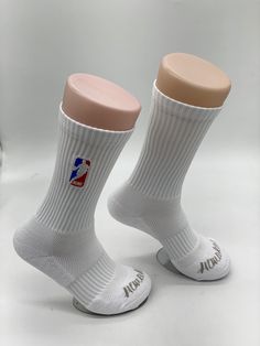 Description: Performance crew socks with memory yarns, anti-microbial wash, air-vents, compression padding. Kobe logo is embroidered. 37% TC Cotton, 58% Micro Polyester,1% Nylon, 3% Rubber, 1% Spandex. Sizes (Mens Shoe Sizes): M (4-8), L (8-12), XL (12-16) Breathable Streetwear Socks, Comfortable Breathable Streetwear Socks, Comfortable Breathable Socks For Streetwear, Comfortable Sweat-resistant White Socks, Comfortable Sweat Resistant White Socks, Comfortable White Sweat Resistant Socks, Breathable Comfortable Socks For Sports Events, Comfortable Anti-odor Socks For Sports Events, Comfortable Sweat-resistant Socks For Sports