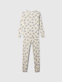 Soft organic cotton pajama set with a cozy brushed interior.  Crewneck.  Long sleeves.  Elasticized waist at PJ pants.  Assorted holiday-themed prints.  Made with 100% organically grown cotton, which is grown without the use of synthetic pesticides and fertilizers.  This product was made in a factory that runs the Gap Inc.  P. A. C. E.  Personal Advancement & Career Enhancement) program.  P. A. C. E.  is our educational program that helps the women who make our clothes build the skills, knowledg Organic Cotton Long Sleeve Sleepwear For Sleepover, Gap Cotton Sleepwear For Pajama Party, Gap Relaxed Fit Sleepwear For Pajama Party, White Cotton Sleepwear By Gap, Gap Long Sleeve Loungewear Set, Playful Organic Cotton Sleepwear For Loungewear, Cotton Gap Sleepwear For Bedtime, Cotton Sleepwear By Gap For Bedtime, Gap Cotton Sleepwear For Bedtime