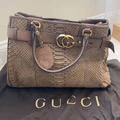 Gucci Tote- Tan Suede Python Bag In Excellent Condition Chic Pre-owned Leather Bag, Luxury Pre-owned Bags, Designer Pre-owned Top Handle Bags, Luxury Pre-owned Shoulder Bag, Luxury Pre-owned Bags For Shopping, Pre-owned Top Handle Leather Bags, Pre-owned Luxury Leather Shoulder Bag, Luxury Pre-owned Double Handle Shoulder Bag, Pre-owned Rectangular Gucci Bag