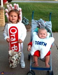 two children with toothbrushes on their heads and ones in pajamas are standing next to each other