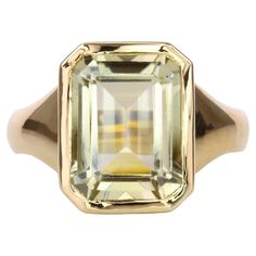 Yellow Tourmaline Pinky Ring Creator: Carson Gray Jewels Ring Size: 5 Metal: 18KT Yellow Gold Stone: Yellow Tourmaline Stone Cut: Emerald Cut Step Cut Weight: 4.75 carats Style: Statement Ring Place of Origin: Congo Period: Modern Date of Manufacture (circa): April 2023 Condition: New At 4.75 carats, this yellow Tourmaline emerald cut pinky ring, set in thick yellow 18 karat gold, commands an audience. This gemstone’s extraordinary colour and clarity make it highly sought after, its bold size an Jewels Rings, Rare Stone, Step Cut, Tourmaline Stone, Gold Stone, Pinky Ring, Stone Cuts, Solitaire Ring, Emerald Cut