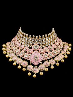 "Gulrukh Meenakari Bridal Set - Pink A pure hand-drawn detailed jewelry in the shades of soft pink and green meenakari work. This piece displays high-quality workmanship and fine usage of stones! This meenakari necklace set is perfect for western or traditional outfits. This set features a necklace with jadai detailing, featuring kundan chand motifs with lotus meenakari detailing. Delicate necklace accented with kundan stones and faux pearls creating a lush, sparkling set. The set includes a pai Designer Gold Jewelry With Meenakari, Designer Meenakari Chandbali Jewelry, Traditional Festive Jewelry With Mirror Work, Designer Festive Silver Jewelry, Ceremonial Kundan Jewelry With Motifs, Meenakari Chandbali Choker, Designer Kundan Jewelry For Gifts, Designer Kundan Jewelry As A Gift, Traditional Chandbali Jewelry With Mirror Work