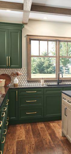 #ThomasvilleCabinetry #ModernKitchen #KitchenRemodel #DreamKitchen #Trend #KitchenInspo Colored Kitchen Cabinets Green, Green Kitchen Farmhouse Style, Interior Kitchen Cabinet Colors, Green Kitchen Cabinets Apartment, Kitchen Cabinets Same As Wall Color, Viridian Green Kitchen, Green English Cottage Kitchen, Black And Green Cabinets Kitchen, Bold Green Kitchen Cabinets