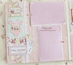 a baby's album with pink and white designs on it, including a teddy bear