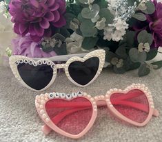 Heart shaped personalised sunglasses These glasses can be made in White, Black or pink and can have any name added to them.  These are perfect for hen parties, birthday parties, wedding favours. Fun Sunglasses As Valentine's Day Gift, Fun Sunglasses For Valentine's Day Gift, White Sunglasses With Gradient Lenses As Gift, White Sunglasses With Gradient Lenses As A Gift, Personalized Pink Sunglasses As A Gift, Pink Personalized Sunglasses For Gift, Valentine's Day Gift Sunglasses With Tinted Lenses, Pink Heart-shaped Party Sunglasses, Pink Tinted Sunglasses As Gift