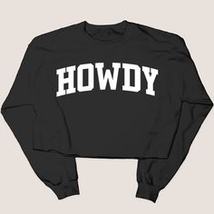 This trendy Howdy shirt is a must-have in any Texan's wardrobe. Show off your state pride with the classic "Howdy" slogan featured on this exclusive Texas collection shirt. Perfect for a casual day out or a game day outfit. 8 oz./yd² (US) 13.3 oz./L yd (CA), 50/50 cotton/polyester, 20 singles Classic Fit Air jet yarn for softer feel and reduced pilling Double-needle stitching at shoulders, armholes, neck, waistband and cuffs 1x1 rib with spandex for enhanced stretch and recovery RETURNS & EXCHAN Trendy Long Sleeve Tops For Game Day, Graphic Tee Long Sleeve Top For Game Day, Trendy Tops With Lettering For College, Trendy Lettered Tops For College, Cotton Tops With Lettering For Game Day, Howdy Shirt, Cards Sign Wedding, Texas Shirt, Valentines For Mom