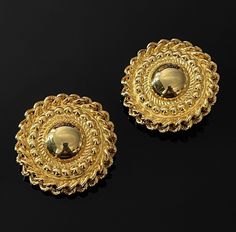 Luxurious, stunning and large Vintage signed Givenchy Clip On Retro Earrings. Real gold gilt with luxury Twisted patterns. Simple clip on ears. If you love stunning large size earrings like me, this is a must-have, and will sure get you lots of compliments ✨ Extremely rare vintage item. Only One! Have great collection value 💃  Measurements: 4cm x 4cm In mint vintage condition (one cushion slightly misplaced, doesn't affect the overall look) 👌  ✨FREE shipping worldwide  🚭 Smoke-free home Luxury Retro Clip-on Earrings For Women, Luxury Retro Clip-on Earrings, Luxury Vintage Clip-on Hoop Earrings, Luxury Vintage Gold-tone Earrings, Vintage Yellow Gold Clip-on Earrings, Luxury Yellow Gold Vintage Clip-on Earrings, Black Bangle, Twist Pattern, Retro Earring