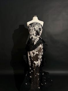 This exquisite Marchesa evening gown in size US 6 is a luxurious blend of elegance and drama. The gown features a beautifully embroidered top with intricate floral details, contrasting against the flowing black fabric. The ruffles cascading down the bottom of the gown add movement and volume, making it perfect for grand entrances at formal events. This brand new gown, originally priced at $6,995. Size: US 6 Fabric: Embroidered top with ruffled bottom Condition: Brand New Silhouette: Maxi gown wi Diy Clouds, Maxi Gowns, Gown Dress, Black Maxi, Marchesa, Beaded Dress, Embroidered Top, Black Maxi Dress, Dress Clothes For Women