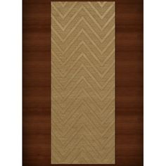 the rug is made from wood and has an interesting pattern on it's surface