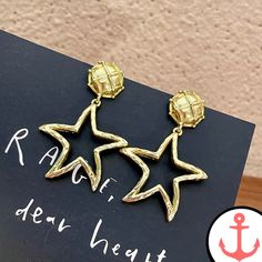 Elevate Your Style with Gold Hollow Starfish Earrings Indulge your love for the sea and its evocative symbols with our exquisite Gold Hollow Starfish Earrings. Part of our captivating Starfish Earrings collection, these earrings beautifully encapsulate the grace and mystique of the ocean. Crafted with meticulous attention to detail, they are the perfect accessory for any passionate sea lover. Features of Gold Hollow Starfish Earrings Understated Elegance: The delicate design of these earrings sh Elegant Metal Earrings With Star Charm, Gold Elegant Earrings With Starfish Charm, Metal Starfish Jewelry, Elegant Gold Earrings With Starfish Charm, Gold Starfish Charm Jewelry For Party, Metal Starfish Charm Jewelry, Metal Drop Earrings With Star Charm, Elegant Starfish Charm Drop Earrings, Elegant Starfish Charm Earrings As Gift