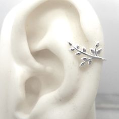 Includes One 925 Sterling Silver Heart Ear Cuffs. Crafted With Love, These Ear Cuffs Feature A Stunning Leaf, Perfect For Adding A Touch Of Romance To Any Outfit. With The 925 Signed Hallmark, You Can Trust The Quality And Authenticity. Made With 925 Sterling Silver, These Earrings Are Not Just Beautiful But Also Durable. Elevate Your Look With Our Heart Ear Cuffs And Make A Statement Wherever You Go. Minimalist Silver Ear Climbers For Anniversary, Sterling Silver Ear Cuff As A Gift, Silver Ear Cuff With Matching Earrings For Anniversary, Silver Ear Cuff For Anniversary, Adjustable Sterling Silver Ear Cuff With Ear Wire, Silver Single Ear Cuff For Anniversary, Sterling Silver Ear Cuff With Ear Wire For Weddings, Adjustable Sterling Silver Ear Cuff, Minimalist White Sterling Silver Ear Cuff