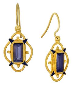 Putting old world sensibilities into this earring design. Scallops of filigree coil and blue enamel points accent a faceted iolite stone. Crafted by hand, with a 24k gold over sterling silver setting. Hoop backs for pierced ears. Size:1 1/4 Inch. Horse Sweater, Iolite Stone, Fire Opal Earrings, Laurel Burch, Knot Earrings, Opal Earrings, Hand Made Jewelry, Gold Plated Earrings, Gorgeous Earrings