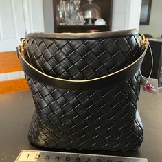 This Bag Is New With Tags. There Was A Piece Of Tape That Had Gotten Stuck To The Bag. It Left A Few Little Grey Areas When The Tape Was Removed. Nothing That Would Effect The Use. A Few Dots Of A Black Sharpie Could Take Care Of It And It Would Not Be Noticeable. It Is A Really Nice Bag. Formal Rectangular Bucket Bag With Braided Handles, Formal Rectangular Hobo Bag With Braided Handles, Black Hobo Bag With Detachable Strap For Shopping, Formal Pouch Shoulder Bag With Braided Handles, Formal Tote Bag With Braided Handles, Formal Shoulder Bag With Braided Handles, Black Rectangular Hobo Bag With Detachable Strap, Black Rectangular Hobo Bag With Braided Handles, Black Pouch Hobo Bag