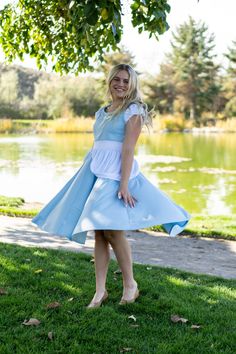 Whether you're attending a themed party or embracing your inner princess on a special occasion, our Twirling Cinderella Dress is sure to make you feel like the belle of the ball. Designed for twirling - cut from a full circle of fabric which allows it to billow out as you spin Elegant white puff sleeve to add both charm and comfort Classic white peplum for that timeless Cinderella feel Made from breathable, stretchy, mid-grade soft knit fabrics Accessories Sold Separately Fitted Princess Dress For Garden Party, Fitted Fairytale Princess Dress For Spring, Fitted Princess Fairy Dress For Garden Party, Princess Style Fitted Dresses For Themed Events, Fitted Fairytale Dress For Themed Events, Spring Costume Party Dresses With Full Skirt, Spring Full Skirt Dresses For Costume Party, Princess Style Twirl Dress For Dress-up, Snow White Fitted Wedding Dress