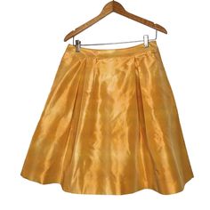 Banana Republic Yellow Gold Pleated Silk Skirt With Side Zip Closure. Size 4. Shell 100% Silk. Lining 100% Acetate. Dry Clean. Measures Approximately 14 1/2” Waist Measured Flat Across, 23” Length. Msrp $88. Nwt Elegant Yellow Flowy Skirt, Elegant Flowy Yellow Skirt, Fitted Gold Skirt For Spring, Yellow A-line Pleated Skirt, Elegant Yellow Pleated Skirt, Yellow Pleated Party Bottoms, Elegant Yellow Pleated Bottoms, Yellow A-line Bottoms For Spring, Yellow Flared Party Skirt