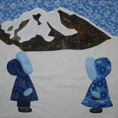 an image of two people standing in front of a mountain with snow on the ground