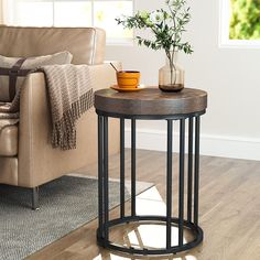 a living room with a couch, chair and table