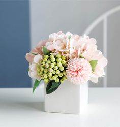 PRICES MAY VARY. Material: Artificial flower ceramic pot is made of 100% brand new and high quality fake cloth + ceramic basin. clear elegance and fresh matching with light colors. Add warm and sweet atmosphere to home decoration. Size: Total height: 14.9cm/5.9"; the height of the ceramic pot: 7cm/2.76 Multipurpose Artificial Flowers With Ceramic Pot: Simulation flowers is perfect for decorating home, living room, bedroom, dining room, kitchen, hotel, office, wedding, party, bar, dressing table Navy And Gold Office, Hydrangea Flower Arrangement, Hydrangea Flower Arrangements, Gold Office Decor, Plant Notes, Hydrangea Colors, Faux Hydrangea, Pink Office, Faux Flower Arrangements