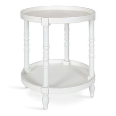 a white round table with two legs and a shelf on one side that holds a glass top