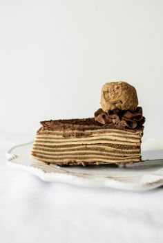 a piece of cake sitting on top of a white plate